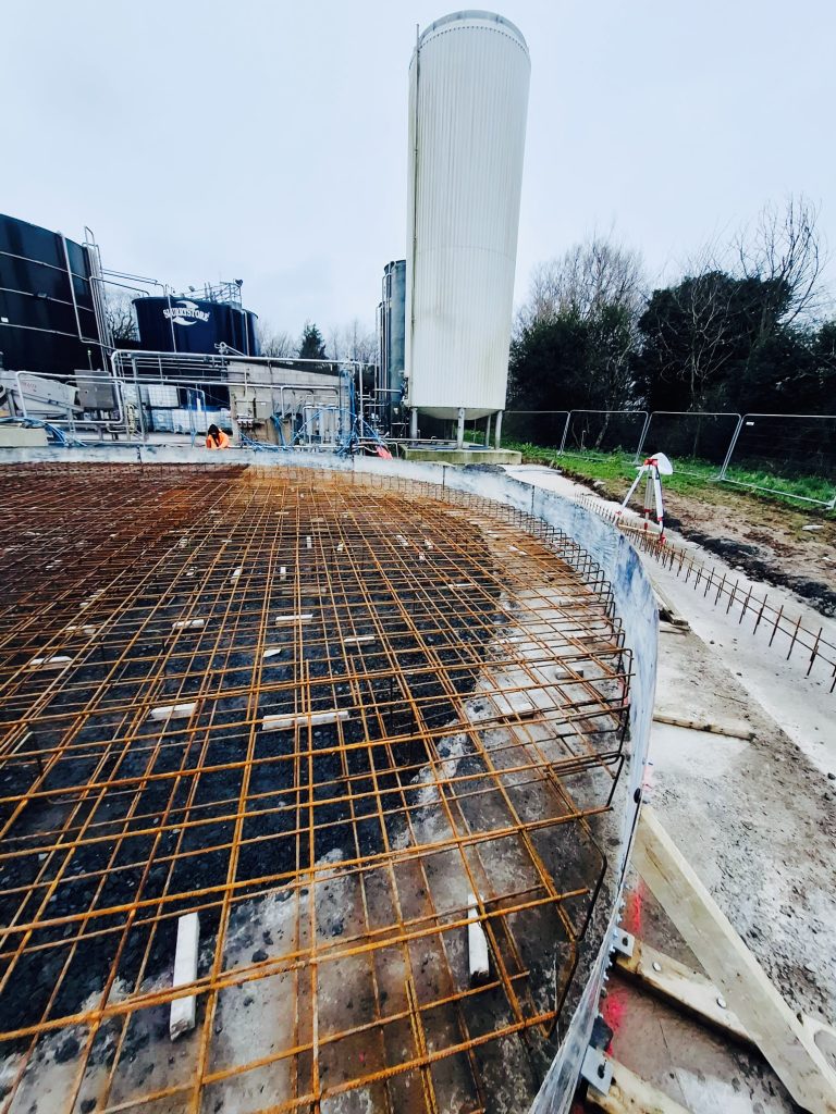 Steel reinforcement installation is underway on this circular slab, forming a critical foundation for the structure. The reinforcement has been carefully set to specification, ensuring strength, stability, and long-term performance. This phase prepares the slab for the upcoming concrete pour, keeping the project on schedule and moving safely into the next stage.